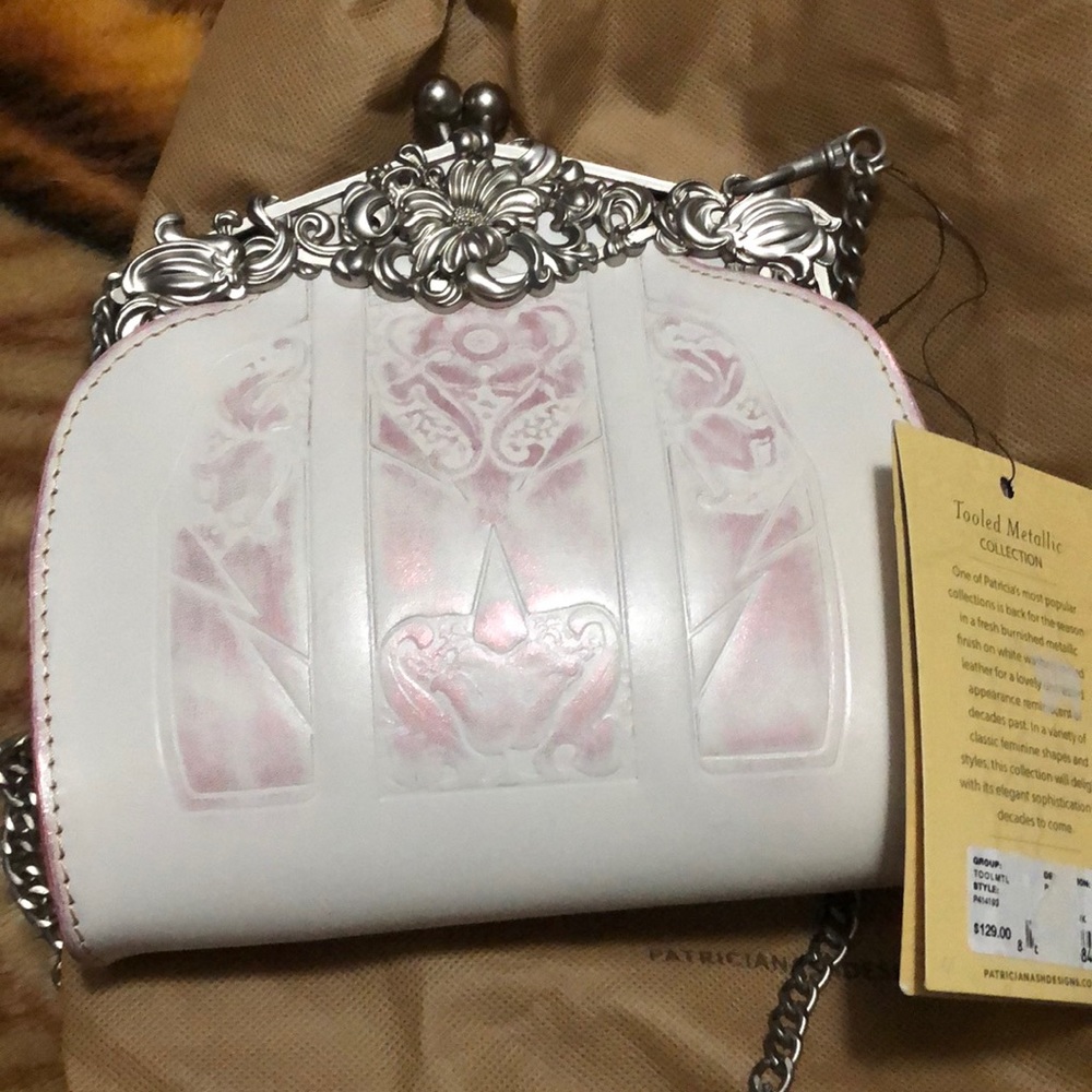 Patricia Nash Pink metal frame and white clutch